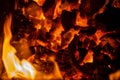 Close up photo on red coals in bonfire Royalty Free Stock Photo