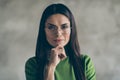 Close up photo of serious confident clever woman touching her chin with hand wearing spectacles eye glasses wear