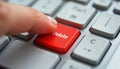 Close-up photo shows finger poised over red delete key. Action data removal erasure. Digital interaction demonstrates urgency,