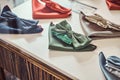 Close-up photo of a silk bow ties different colors on table in a menswear store.