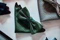 Close-up photo of a silk bow ties different colors on table in a menswear store.