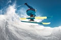 Close-up photo of skier jumping over camera Royalty Free Stock Photo