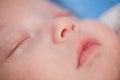 Close up photo of sleeping newborn baby face Royalty Free Stock Photo