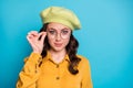 Close up photo of smart cute pretty girl lady look good spectacles impressed bargain novelty isolated over blue color Royalty Free Stock Photo