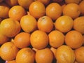 Close up photo of stack of oranges on the fresh fruit market Royalty Free Stock Photo