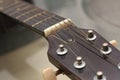 A close up photo taken on an acoustic guitar neck Royalty Free Stock Photo