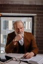 Close up photo of thinking old man writing a letter to his old lady Royalty Free Stock Photo