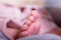 Newborn toes. Close up. Caucasian baby girl. Royalty Free Stock Photo