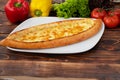 Close up of Turkish Pide bread on wooden table