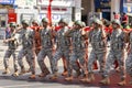 Close-up photo of Turkish soldiers carrying gigantic Turkey flag and marching during August 30, Victory Day parade in Ankara