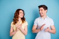 Close up photo of two pair people look each other romantic date appreciate clap arms wear casual t-shirts isolated blue