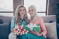 Close up photo two people she her ladies child grandmother grandchildren visit birthday party deliver mommy giftbox