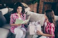 Close up photo two people mum little daughter giving present box card with mommy poem unexpected sweet cute reading