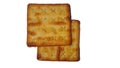 Close-up photo of two square biscuits stacked, isolated on white background. Royalty Free Stock Photo
