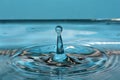 Macro shot of drops making ripples in water Royalty Free Stock Photo