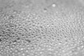 Close-up photo of water drops hanging on a transparent surface Royalty Free Stock Photo