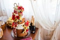 Close-up photo of a wedding cake decorated with pastry flowers, Royalty Free Stock Photo