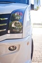 Close-up photo of white modern minibus