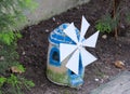 A windmill decorative furniture for garden Royalty Free Stock Photo