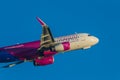 Close-up photo of a wizzair plane on the sky