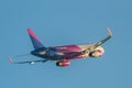 Close-up photo of a wizzair plane on the sky