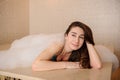 photo of a young woman in white foam relaxing in a hamam Royalty Free Stock Photo