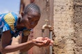 Close-up Photograph: African Black Teenage Girl Drinking Water Royalty Free Stock Photo