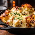 A close-up photograph of a baked cheese cauliflower dish