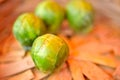 A close-up photograph of Brussels sprouts placed in a cane basket. Royalty Free Stock Photo