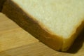 A Close up photograph of a Slice of Wheat Bread.