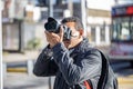 Close-up of a photographer taking a picture