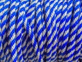 Close-up photography of a blue and white nylon rope Royalty Free Stock Photo