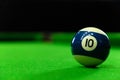 Close-up photos of billiard ball, number 10 and green floor Royalty Free Stock Photo