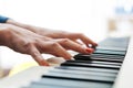 Close up of pianists hand playing piano. Shallow deep of field. Royalty Free Stock Photo