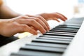 Close up of pianists hand playing piano. Shallow deep of field. Royalty Free Stock Photo