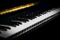 Piano keys of a classic piano in the dark