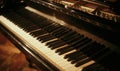 Close up of piano keys with golden bokeh background. Music concept Royalty Free Stock Photo