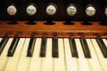 Close-up of a piano keys oir keyboard of old, historic clavichord or harpsichord