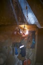 Close up pic of rope access welder wearing safety equipment abseiling hanging on harness as fall arrest position welding repairs Royalty Free Stock Photo