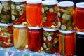 Close up of pickled vegetables in glass jars