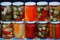 Close up of pickled vegetables in glass jars