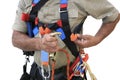 Close up pics of male industrial rope access worker wearing dressing fall arrest safety protection harness Royalty Free Stock Photo