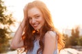 Close up picture of Beauty Smiling Ginger girl in dress