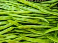 Close up picture of a bunch of green beans in the market. Horizontal