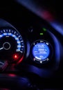 Car dashboard, speedometer panel in night time. Royalty Free Stock Photo