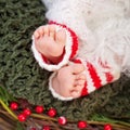 Close up picture of new born baby feet, christmas time