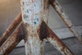 A close-up picture of an old rusted iron pillar Selectable focus