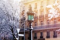 Old snow covered lamp post against winter Paris Royalty Free Stock Photo