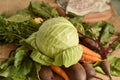 Ripe fruits of vegetables, white cabbage, beets and carrots lie on the table. Royalty Free Stock Photo