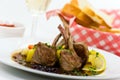 Close up picture of a roasted lamb chop and vegeta Royalty Free Stock Photo